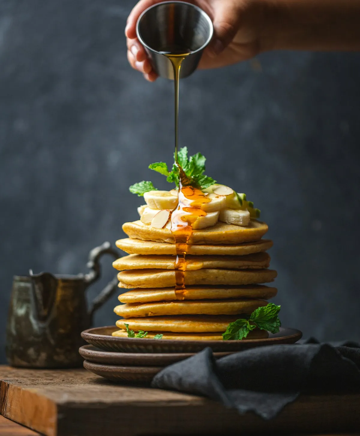 Stack of fluffy pancakes with fresh berries