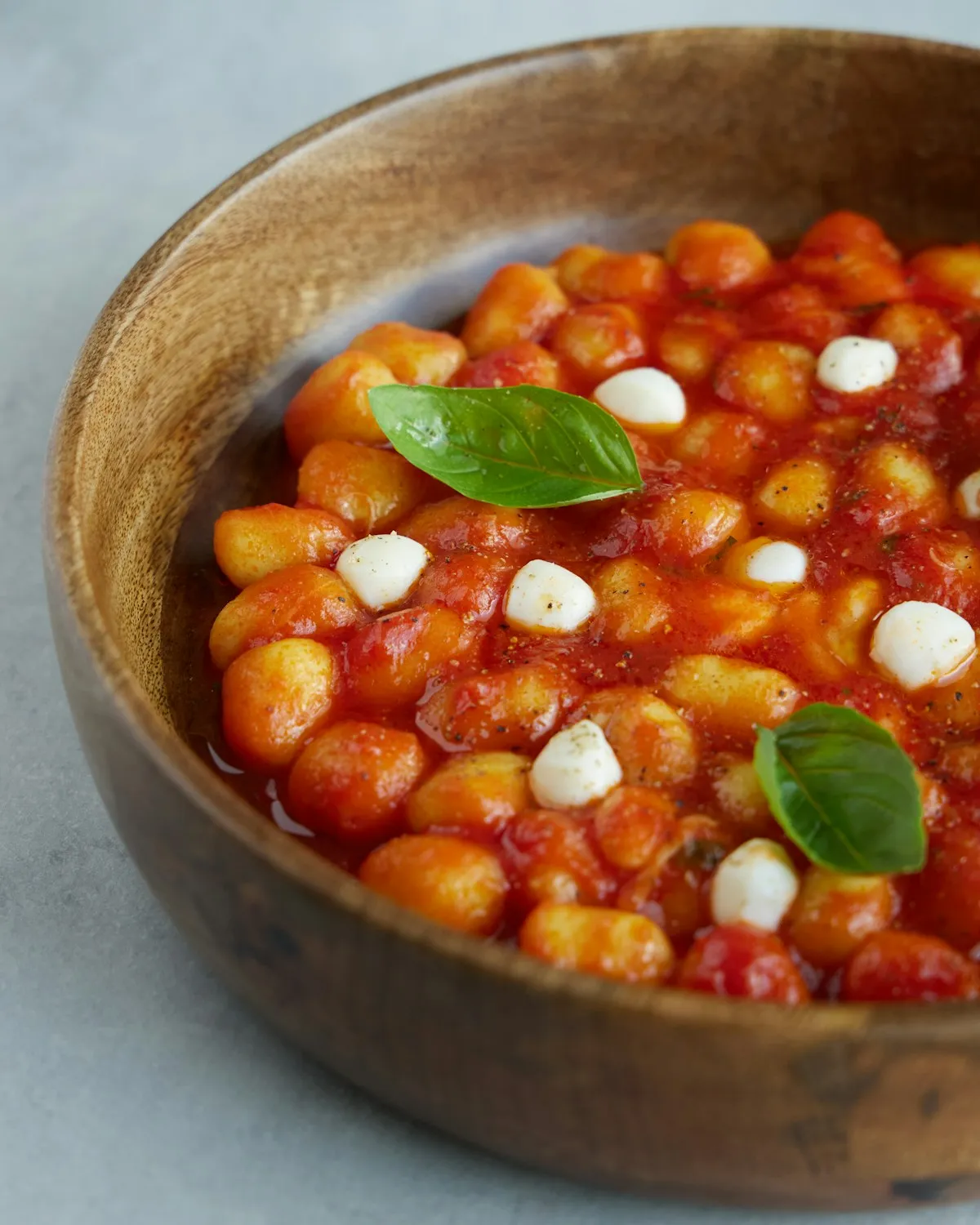 Gnocchi with tomato sauce, mozzarella and basil