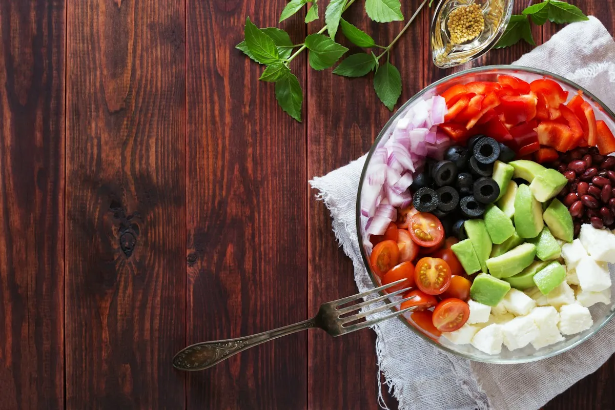 Colorful bowl of fresh salad, vegetables and feta
