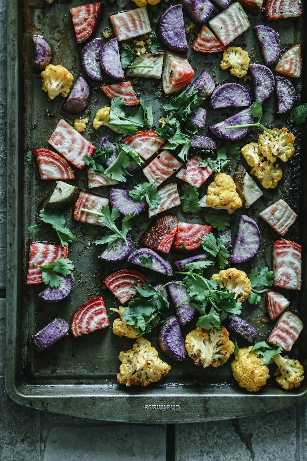Colorful roasted vegetables with herbs